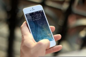 Holding iphone
